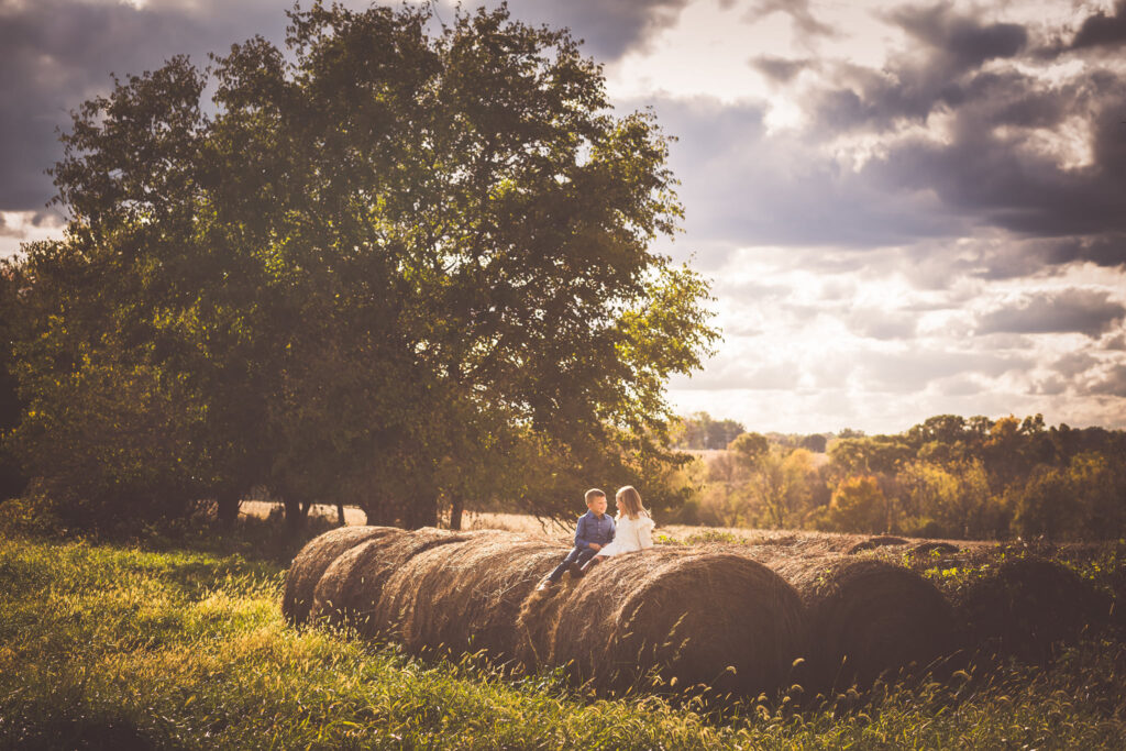 Children on a hay bale ay Norristown Farm Park-Debra Heschl Photography-Brother & sister on a haybale