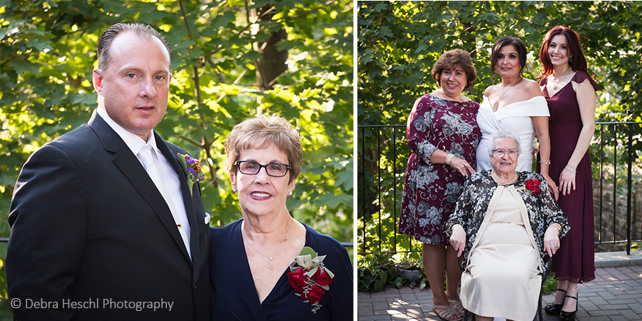 Groom posing with his mother and bride's family gathered around grandmother in wheelchair at wedding.