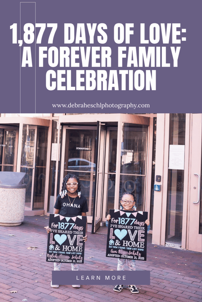 Two smiling children stand in front of a building, holding signs celebrating 1,877 days with their family. The tone is joyful and festive.